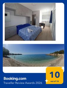 a bedroom with a bed and a view of the ocean at Agria Rigani Studios in Samos