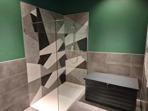 a bathroom with a shower with a glass door at Mini alloggi alle terme in Abano Terme