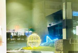 a view of a building with a sculpture in front of it at Mini alloggi alle terme in Abano Terme