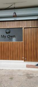 a building with a my own drink sign on the door at My own dormitory in Cochin
