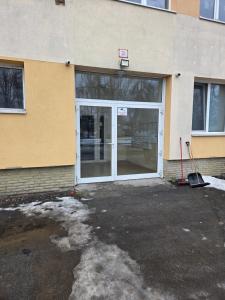 a door with a basketball hoop in front of a building at Apartmán KN in Liptovský Mikuláš