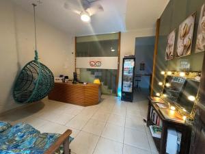 a room with a store with a large room with at Hostel Casa 8 in Rio de Janeiro