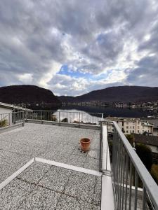 a balcony with a view of a body of water at Via privata in Lugano