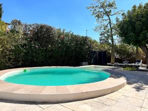 a small pool of water in a yard at Casa Mar in Valencia
