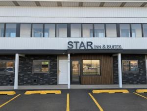 a star inn and suites building with a parking lot at Star Inn & Suites in Chicago Heights