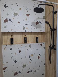 a rock wall in a bathroom with a rock wall at Casa Delia in Balta +46 photos