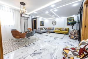 a living room with a large marble floor at Sky View by Luxurious Holidays in Rabat