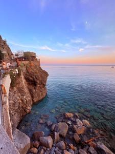 a view of the ocean from a cliff at Da Vice Rooms in Monterosso al Mare +103 photos