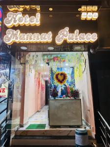 a store front with a sign for a flower salon at Hotel Mannat palace in Ujjain