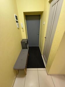 a hallway with a bench in front of a door at Tallinn Randla 14 in Tallinn