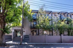 an apartment building on the corner of a street at Boho by the Bay in Melbourne