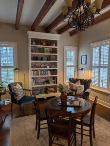 a living room with a table and chairs at Ravenscroft Inn in Port Townsend