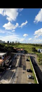 a group of cars parked in a parking lot at Detalhes que te convida a aproveitar in Sorocaba