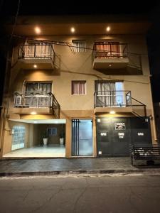 a building with two balconies on top of it at Edificio LUMARO in San Fernando del Valle de Catamarca