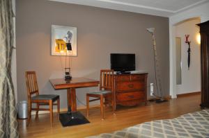 TV a/nebo společenská místnost v ubytování Appartements Hofquartier