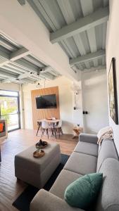 a living room with a couch and a table at GZ Suites in Coco