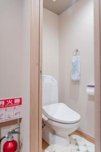 a bathroom with a white toilet in a room at 三十三 和華waka in Kyoto +22 photos