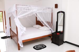Et værelse på Dilara Resort Mirissa