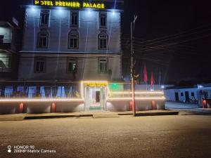 a building with lights in front of it at night at Hotel Premier Palace Pvt Ltd in Bhairāhawā