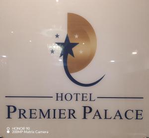 a sign for a hotel premier palace with a crescent and star at Hotel Premier Palace Pvt Ltd in Bhairāhawā