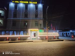 a building with lights in front of it at night at Hotel Premier Palace Pvt Ltd in Bhairāhawā