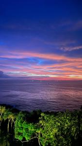 a view of the ocean at sunset at Park Paradise in Galle +53 photos