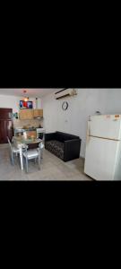 a living room with a couch and a table at Alquileres BH in La Rioja