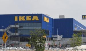 a large blue building with a ikea sign on it at NeoSkyhigh Suites in Batu Kawan