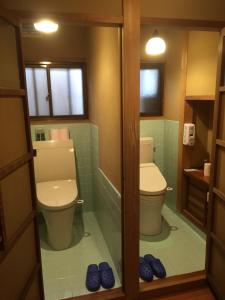 Koupelna v ubytování 一組限定の貸切空間 Guest House Engiya