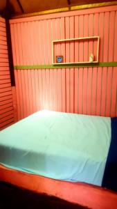 Postel nebo postele na pokoji v ubytování Kohchang 7 seaview bungalow