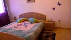 Кровать или кровати в номере Residence Ghassen