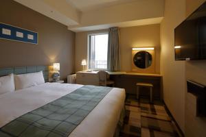 Postel nebo postele na pokoji v ubytování Hotel Monte Hermana Kobe Amalie