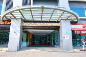 an entrance to a pizza barber shop in a building at D Gateway Perdana Hotel Bangi in Bangi