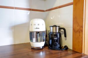 a coffee maker sitting on top of a counter at Spacious 3-Bed Home in Central Tenterfield in Tenterfield