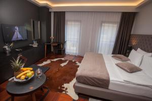 Postel nebo postele na pokoji v ubytování Solun Hotel & SPA