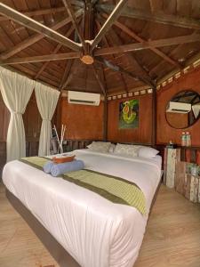 a bedroom with a large bed in a room at Tingkat Valley in Ipoh