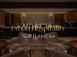 a sign that reads proud hospitaliability skillaring in a hotel lobby at Shiba Park Hotel in Tokyo
