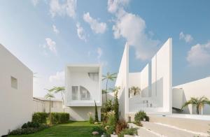 a rendering of a white house with palm trees at MITI TIKAAN villa in Ban Muang Chum