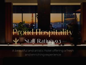 a sign that reads proud hospitaliability skill rating at Park Hotel Tokyo in Tokyo