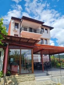 a villa with a view of a house at Guest House Harmony in Veliko Tŭrnovo