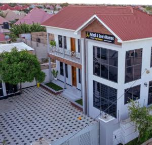 an aerial view of a house with a red roof at Abdel & sons homes in Dodoma