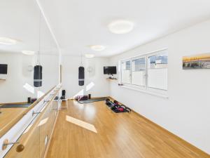 an empty room with a bowling alley at LakeSide Suite in Seeboden