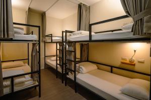 客旅家青年旅館 Travelers Plus 객실 침대