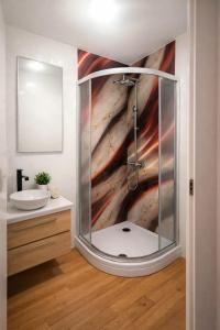 a bathroom with a shower and a sink at Sto Rija in Krk +26 photos