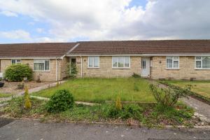 a house with a large yard in front of it at Zadena in Bath