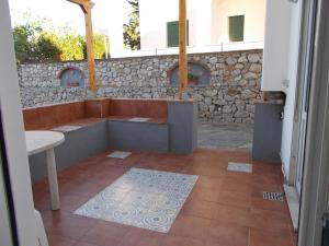Patio alebo iná vonkajšia časť ubytovania Il Merlo