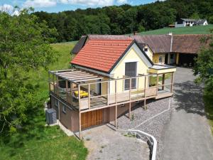 an overhead view of a house with a red roof at Kellerstöckl Pachler in Bad Gleichenberg