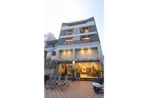 a view of the front of the hotel at Hotel Anmol One in Indore