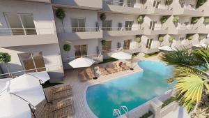 an aerial view of a building with a swimming pool at Asya Blue Apartments in Marmaris