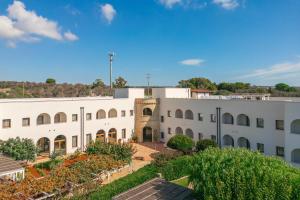 an aerial view of a white building at Hotel Montecallini - Adult Only 14 in Leuca